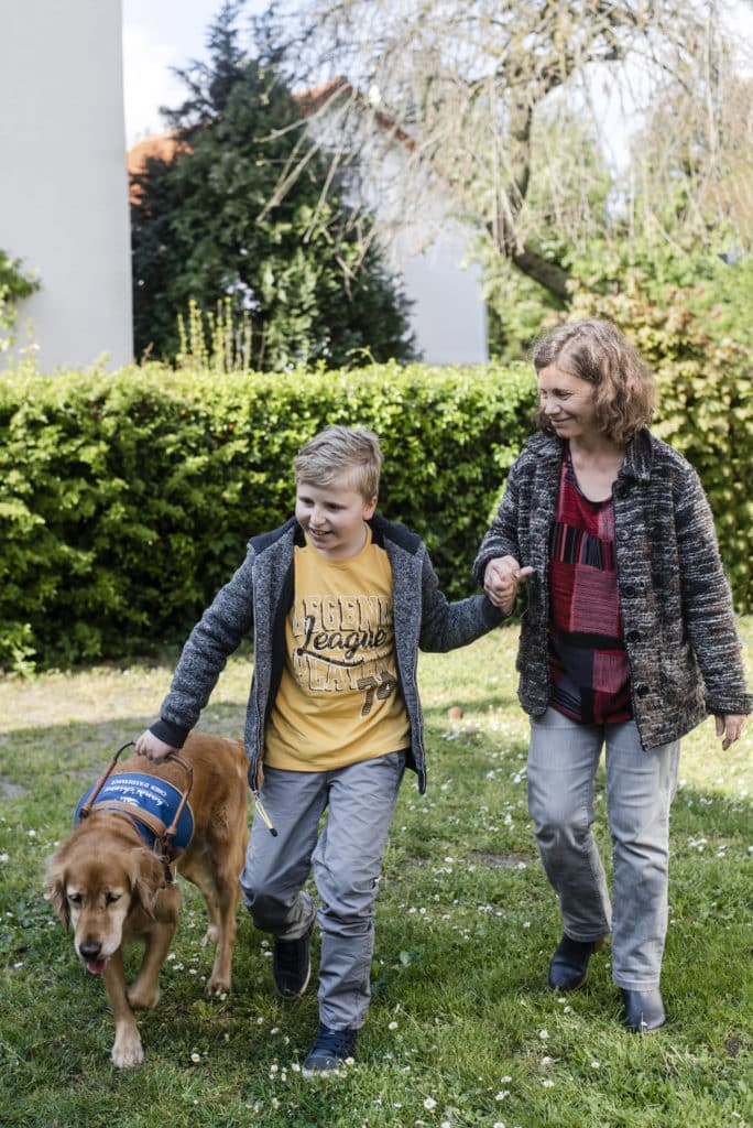 Romain avec Irlande, sa golden Handi'Chiens